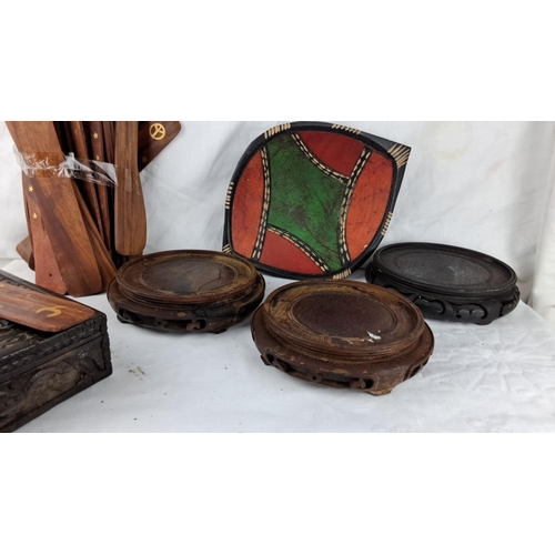 59 - Assorted collection of carved wooden items featuring a decorative box with dragon motif, multicolore... 