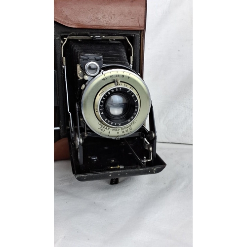 63 - Vintage Kodak No. 1 Diomatic camera with leather case, featuring an Anastigmat lens.