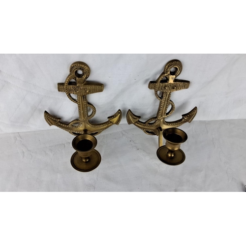 66 - Pair of brass anchor-themed wall candle holders, featuring intricate rope detail.