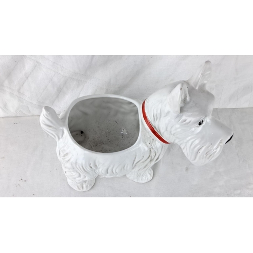 70 - Ceramic Scottish Terrier planter with glossy white finish and red collar accent. From the mid-20th c... 