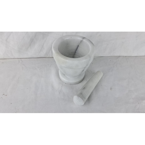 72 - White marble mortar and pestle set, classic design made from durable solid marble.