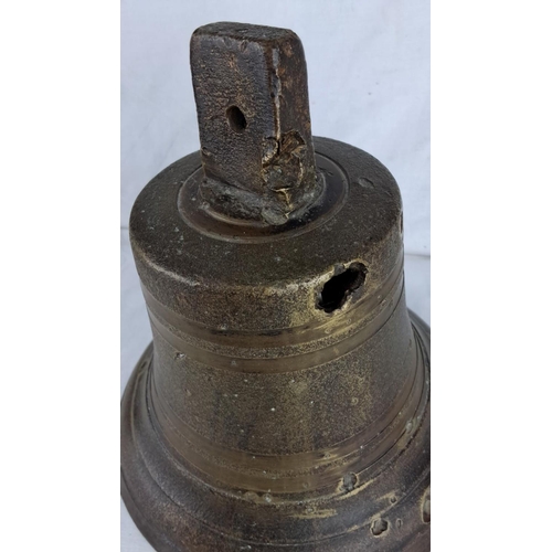 79 - Antique Bronze ship's bell, featuring a classic design with visible mounting bracket.