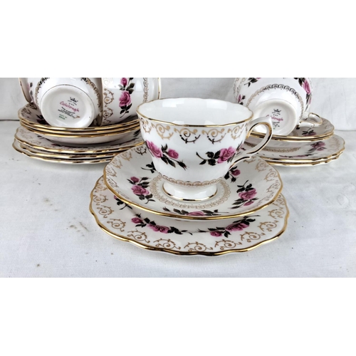 81 - Royal Vale bone china tea set features a pink rose pattern with gold trim and includes cups, saucers... 