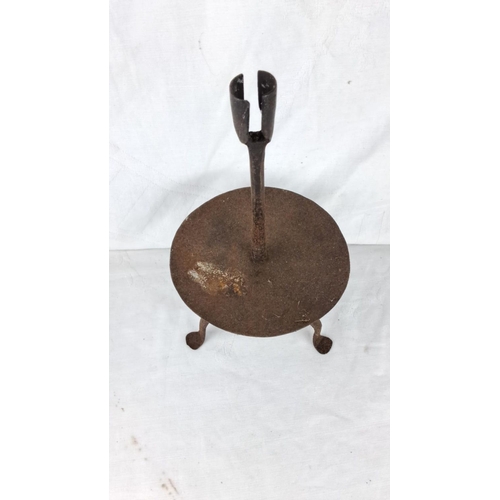 83 - Antique wrought iron candleholder.