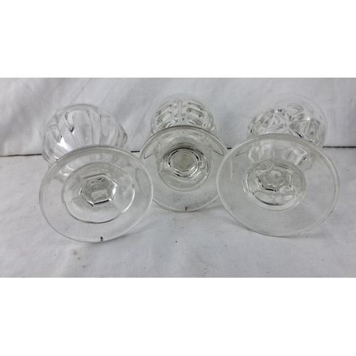 86 - Set of three vintage pressed glass goblets with intricate pattern detailing.