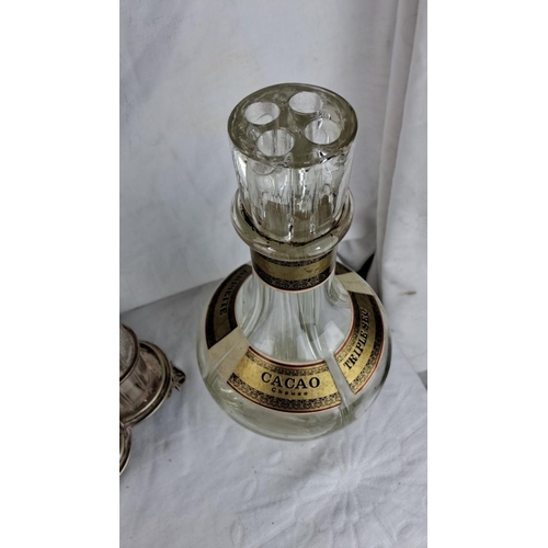 92 - Vintage crystal liquor set with silver accents includes a decanter, cocktail shaker, ice bucket, and... 