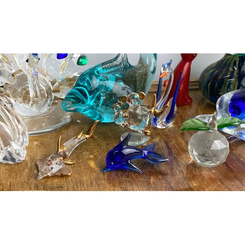 236 - Collection of glass animal figurines and sculptures, including a peacock, dolphin, cat, and various ... 