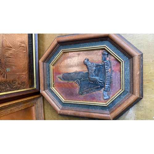 243 - Decorative copper wall plaques showing Irish scenes etc.