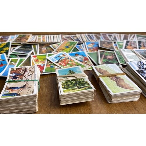 244 - large collection of vintage cigarette cards.