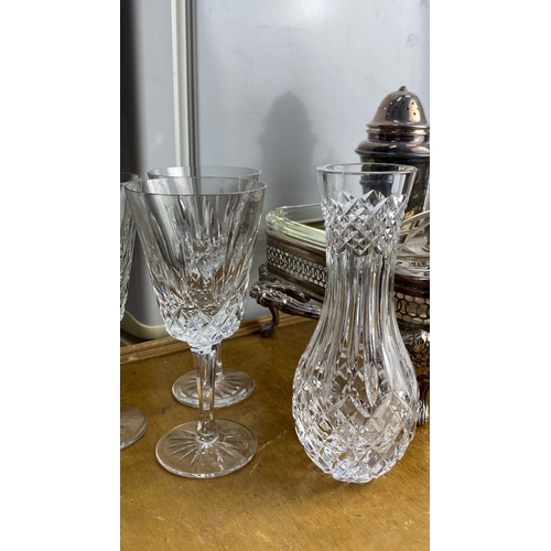 248 - Silver-plated condiment set with glass crystal bowls and glasses, featuring intricate lattice detail... 