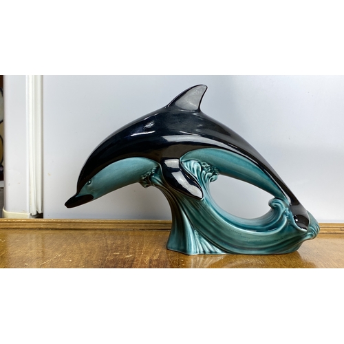 249 - Poole Pottery dolphin figurine, ceramic, features graceful design and aqua tones, marked 