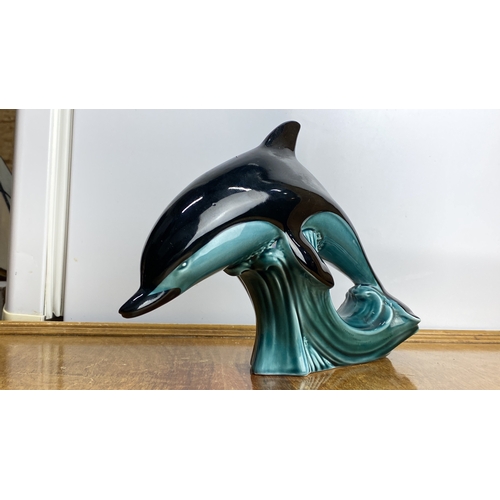 249 - Poole Pottery dolphin figurine, ceramic, features graceful design and aqua tones, marked 