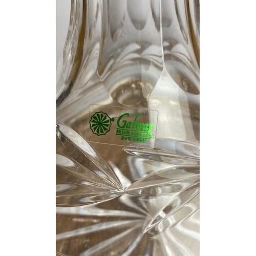 252 - Galway Irish Crystal decanter featuring geometric cut design and faceted stopper.