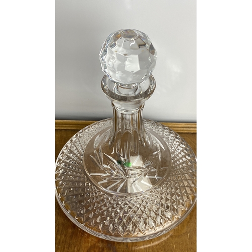 252 - Galway Irish Crystal decanter featuring geometric cut design and faceted stopper.