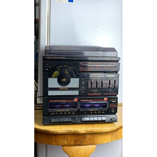 262 - Vintage Compact Disc Midi System with stereo cassette and record player, featuring digital audio tec... 