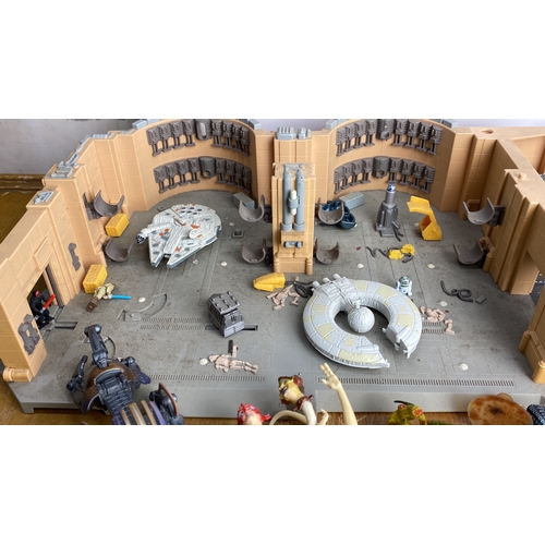 265 - Star Wars playset includes detailed figurines and ships, featuring miniatures of Millennium Falcon, ... 