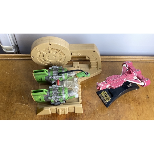 269 - Star Wars Action Fleet toys include a Podracer and fighter ship on display stands with detailed desi... 