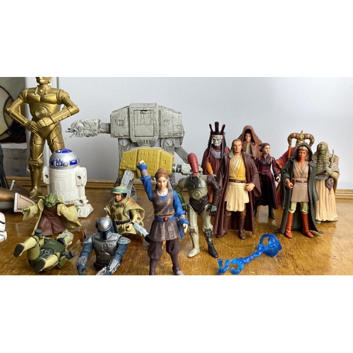 271 - Collection of Star Wars action figures featuring iconic characters and vehicles, including droids an... 