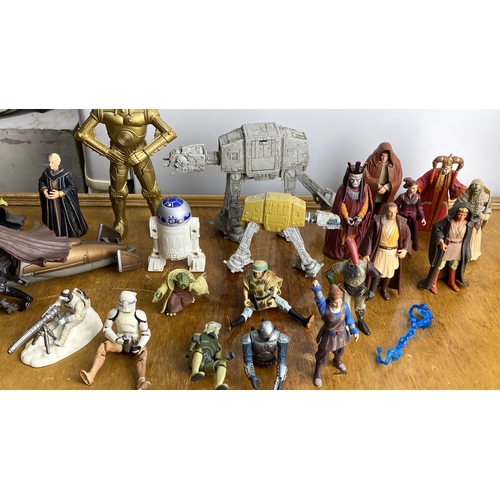 271 - Collection of Star Wars action figures featuring iconic characters and vehicles, including droids an... 