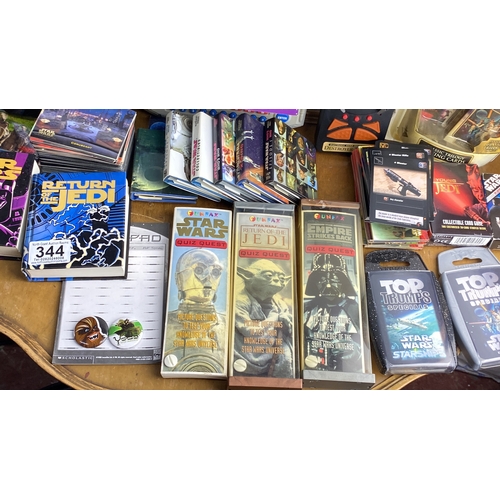 280 - Star Wars collectible lot featuring books, Quiz Wiz games, trading cards, and a Star Wars-themed ele... 