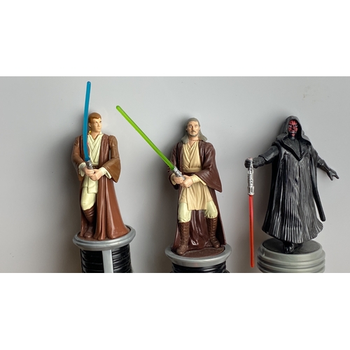 287 - Set of three Star Wars-themed character lightsaber collectible pens, featuring figures with green, b... 