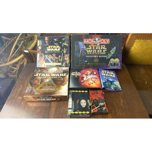 300 - Collection of Star Wars board games and books, including Monopoly Collector's Edition, Trivial Pursu... 