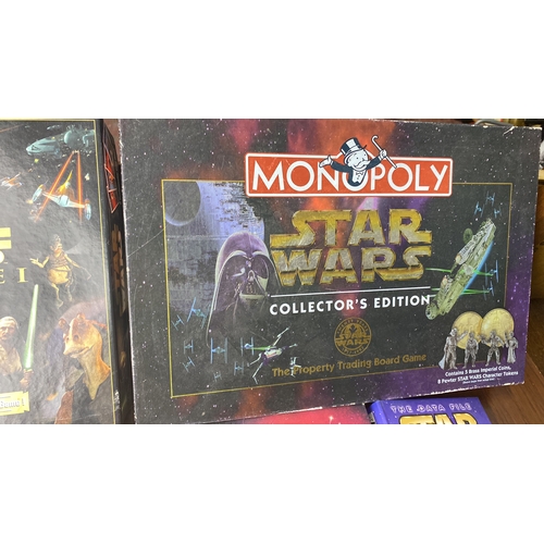 300 - Collection of Star Wars board games and books, including Monopoly Collector's Edition, Trivial Pursu... 