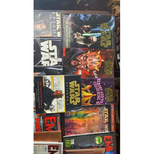 301 - Star Wars memorabilia collection features books and magazines, including titles from 