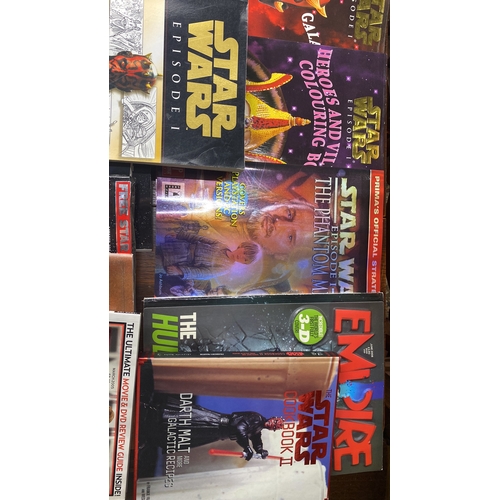 301 - Star Wars memorabilia collection features books and magazines, including titles from 