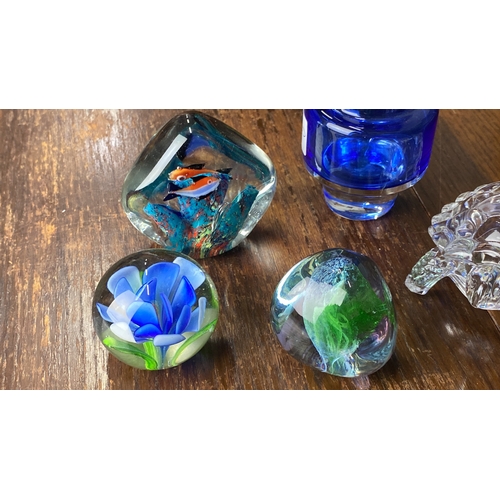 305 - Collection of glass items: blue vase, fish and floral paperweights, curved green abstract sculpture,... 