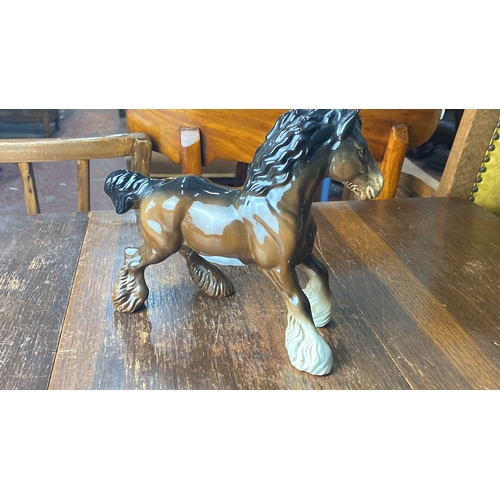 321 - Beswick horse figurine, brown glaze, marked 