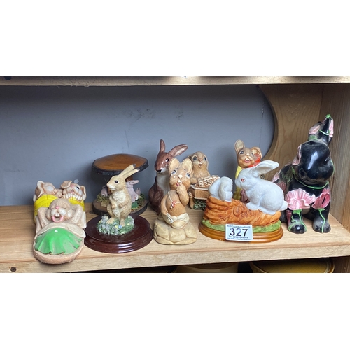 327 - Collection of ceramic rabbit figurines, various styles and colours.