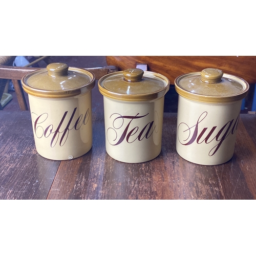 331 - Set of three T.G. Green Ltd ceramic canisters, featuring 