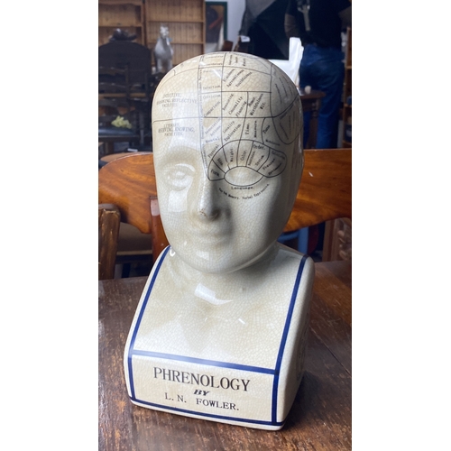 362 - Ceramic L.N. Fowler phrenology head model with crackle glaze, featuring detailed mapped areas of the... 