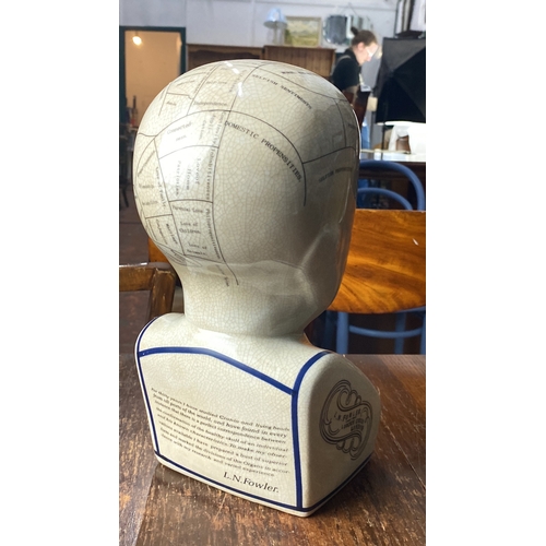 362 - Ceramic L.N. Fowler phrenology head model with crackle glaze, featuring detailed mapped areas of the... 