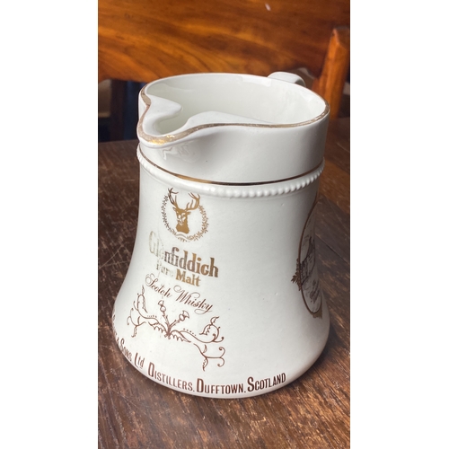 363 - Ceramic jug by Wm Grant & Sons Ltd features gold detailing and a rustic distillery illustration. Tra... 