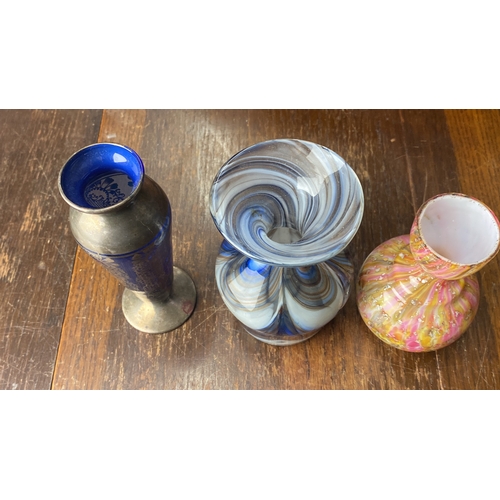 364 - Trio of decorative vases: blue glass with silver overlay, swirling blue and white glass, pink and ye... 