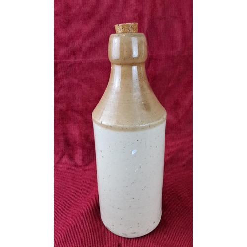 106 - Stoneware beer bottle with cork stopper, inscribed 