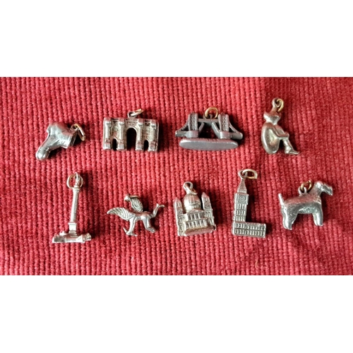 109 - Collection of nine miniature silver charms depicting various landmarks and figures, including Big Be... 