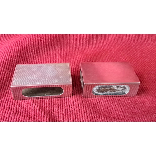 113 - Pair of vintage metal matchbox holders, featuring a textured finish on the left and smooth finish on... 