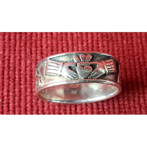 115 - Sterling silver Claddagh ring features Celtic knot and heart designs, stamped 