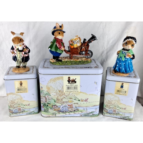 177 - 3 Regency Fine Arts 2002 ceramic rabbit figurines on decorated tins include intricate woodland-theme... 