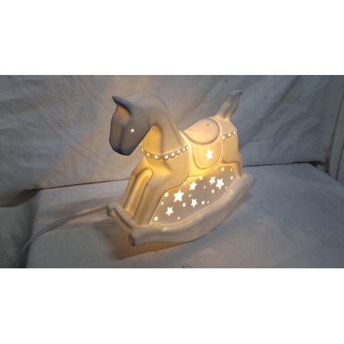 183 - Belleek Living ceramic rocking horse nightlight features star cutouts and a soft, ambient glow.