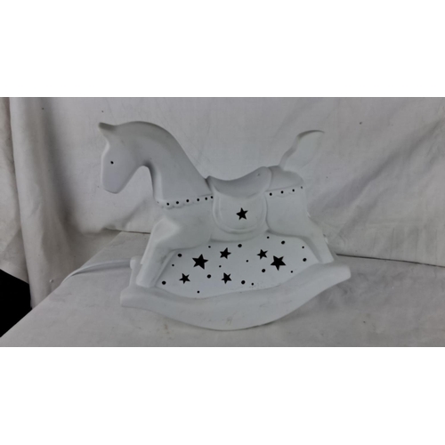 183 - Belleek Living ceramic rocking horse nightlight features star cutouts and a soft, ambient glow.