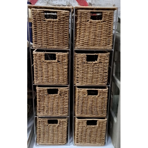 185 - Set of eight woven wicker storage baskets with metal frame.