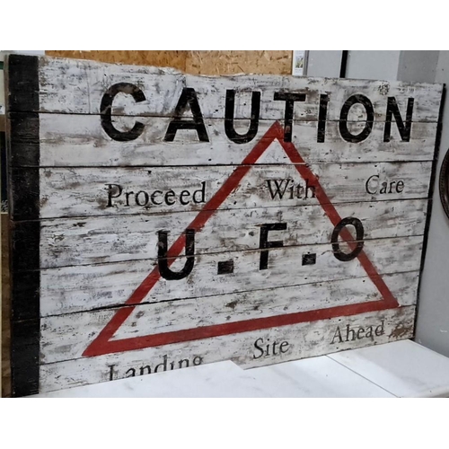 189 - Vintage-style wooden sign features the text 