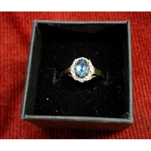 520 - A stunning 9ct gold Blue Topaz and Diamond ring, size P.