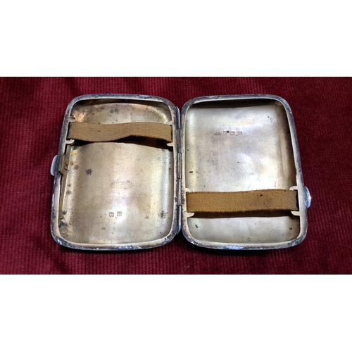 521 - Sterling silver cigarette case with engraved initials. Features hallmarks indicating Birmingham 1921... 