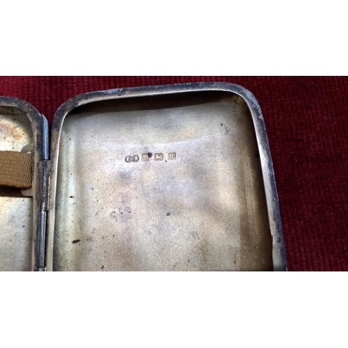 521 - Sterling silver cigarette case with engraved initials. Features hallmarks indicating Birmingham 1921... 