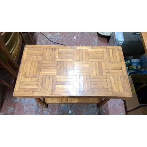 533 - Vintage oak console table with intricate parquet design and turned legs. Includes a lower shelf.